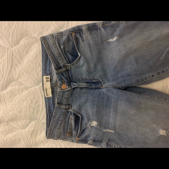 Ripped mid waist skinny jeans
